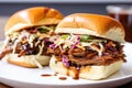 side view of a pulled pork slider with slaw