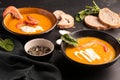 Pumpkin soup with prawns and sour
