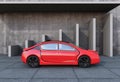 Side view of red autonomous car in front of geometric object background