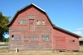 Red Barn with broken windows and blue sky, Willamette Valley, Oregon