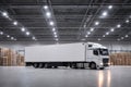 Side View of a Refrigerated Logistics Truck Inside a Warehouse with Stocked Pallets Royalty Free Stock Photo