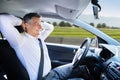 Relaxed Man Sitting In Self Driving Car Royalty Free Stock Photo