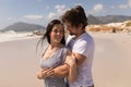 Romantic happy young couple embracing on beach Royalty Free Stock Photo