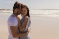 Romantic happy young couple embracing on beach Royalty Free Stock Photo