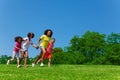 Side view of running children group in the park Royalty Free Stock Photo