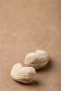 side view of salted roasted pistachios isolated on old paper texture background Royalty Free Stock Photo