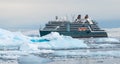 Side view of Seabourn cruise ship on icy sea in Antarctica. Royalty Free Stock Photo