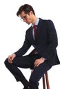Side view of a seated business man with glasses thinking Royalty Free Stock Photo