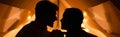 Side view of silhouettes of couple