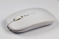 Side view of a sleek white wireless computer mouse Royalty Free Stock Photo