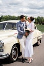 Side view of smiling newlyweds standing Royalty Free Stock Photo