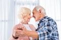 side view of smiling senior couple dancing together Royalty Free Stock Photo