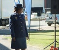 Side view of a South African Police Woman wearing a hat