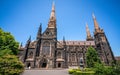 Side view of St Patrick`s Cathedral and spire a Roman Catholic Cathedral church in Melbourne Vic Australia Royalty Free Stock Photo