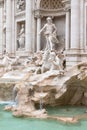 Side view of the statues of the Trevi Fountain in Rome