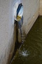 Side view of a storm drain pipe Royalty Free Stock Photo