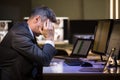 Stressed Businessman Sitting In Office Royalty Free Stock Photo