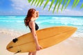Side view surfer woman tropical sea looking waves Royalty Free Stock Photo