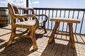 Side View Of Table And Chair On Sunny Porch Royalty Free Stock Photo