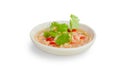 Side view. Thai seafood dipping sauce in white bowl. Make from garlic, red chilli, fish sauce, salt, sugar, lime juice and Royalty Free Stock Photo