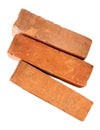 Side view of three cracked old red or orange bricks in stack isolated on white background with clipping path Royalty Free Stock Photo