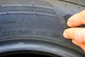 Side view of tire with designation of week and year of tire production