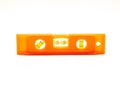 Side view torpedo level with magnetic strip for hands-free work on metal surfaces made of durable PVC, vertically, horizontally Royalty Free Stock Photo