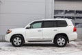 Side view of Toyota Land Cruiser 200 j200 2013 year white color after cleaning before sale in a sunny day on parking. Japan SUV Royalty Free Stock Photo