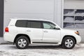 Side view of Toyota Land Cruiser 200 j200 2013 year white color after cleaning before sale in a sunny day on parking. Japan SUV Royalty Free Stock Photo