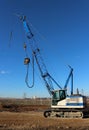 Side view of tracked mobile crane in a construction site