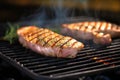 side view of tuna steak on a grill griddle