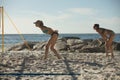 Female volleyball players playing on the beach Royalty Free Stock Photo