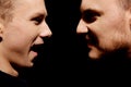 Side view on two screaming men Royalty Free Stock Photo
