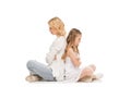 side view of upset daughter and mother sitting back to back Royalty Free Stock Photo