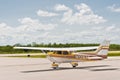 A single prop, private aircraft, taxiing to a airstrip runway, on a tropical, island airport, in the gulf of Mexico,