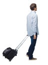 Side view of walking business man with suitcase talking on the phone Royalty Free Stock Photo