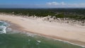 Side view of waves crashing on sandy beach Royalty Free Stock Photo