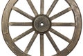 Side view of weathered wooden wagon wheel on white Royalty Free Stock Photo