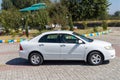 Side view of a white corolla car: Swat, Pakistan - 10 October 2023 Royalty Free Stock Photo