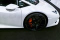 Side view of a White Luxury sportcar Lamborghini Huracan LP 610-4. Car exterior details. Royalty Free Stock Photo