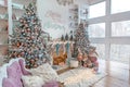 Side view of White living room with big windows and Christmas New year decor,light garland and Christmas tree Royalty Free Stock Photo