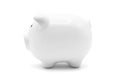 Side view of white piggy bank for money saving isolated on white background with clipping path Royalty Free Stock Photo