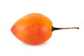Side view of a whole tamarillo