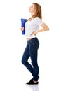 Side view of woman with back pain holding a binder Royalty Free Stock Photo