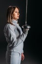 View of woman in fencing suit
