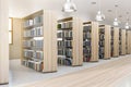 Side view on wooden book shelves in eco style library with silver color lamps on top and wooden floor.