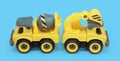 side view yellow plastic toy of concrete mixer and ecavator truck isolated on blue background. Royalty Free Stock Photo