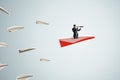 Side view of businessman with binoculars flying on abstract red paper plane on light background. Leadership, journey, Royalty Free Stock Photo