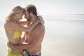 Side view of young couple embracing at beach Royalty Free Stock Photo