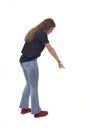 view of a young girl pointing down on white background